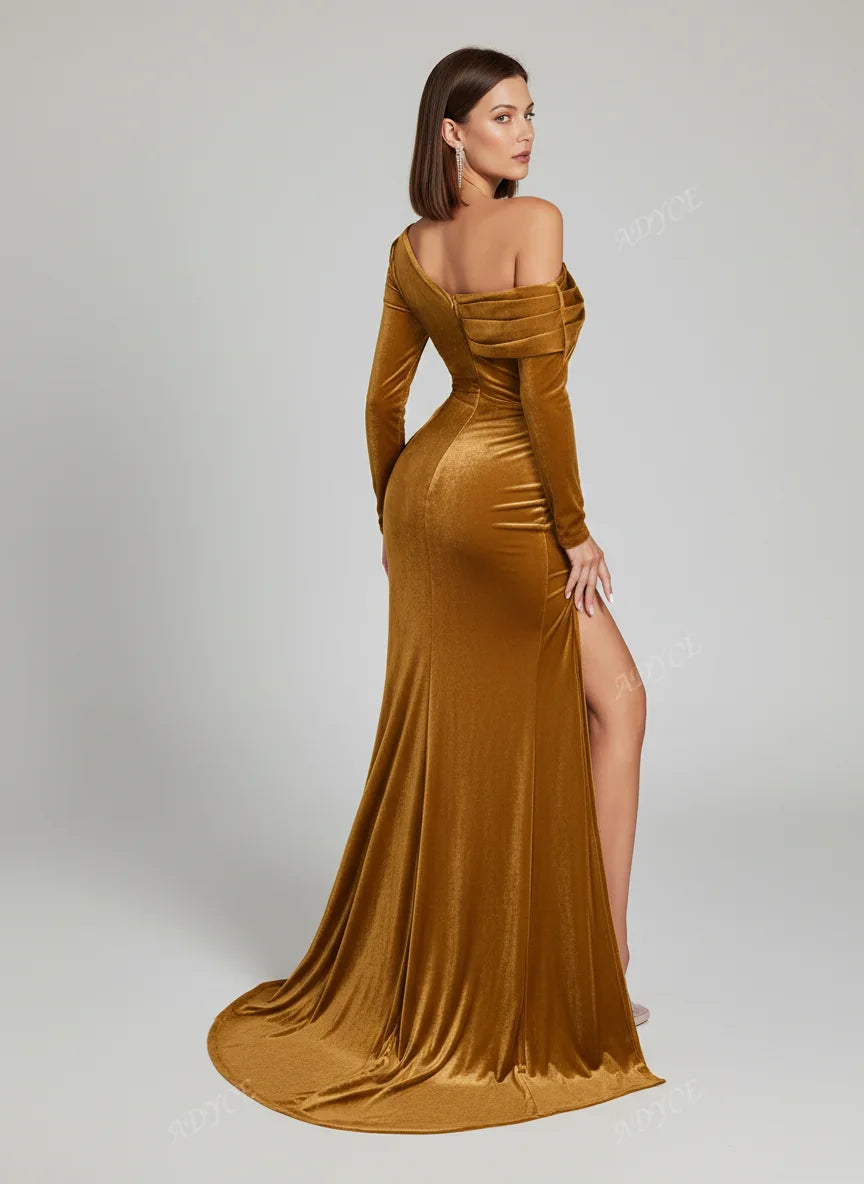 Woman wearing a long, gold evening gown with a slit on a white background