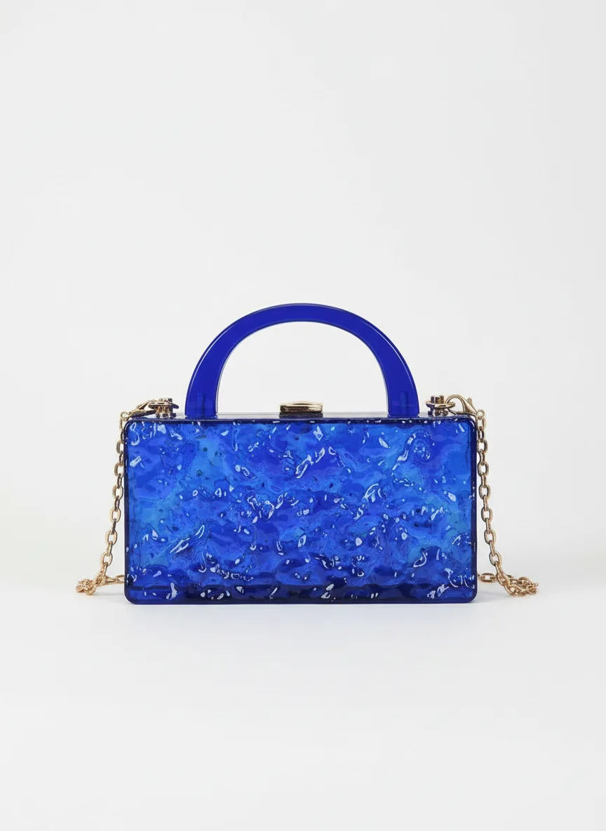 Blue handbag with a chain strap on a white background