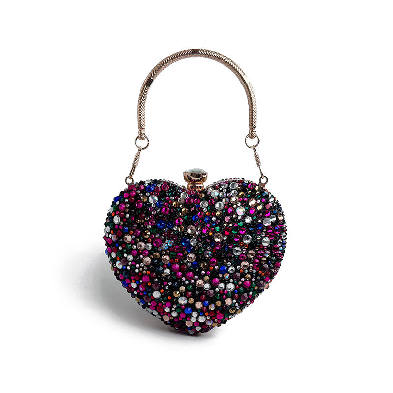 Heart-shaped handbag with multicolored beads on a white background