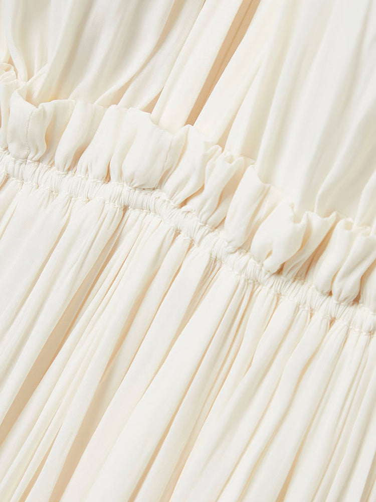 Elegant Layers with Flowing Ruffle Cape Dress 