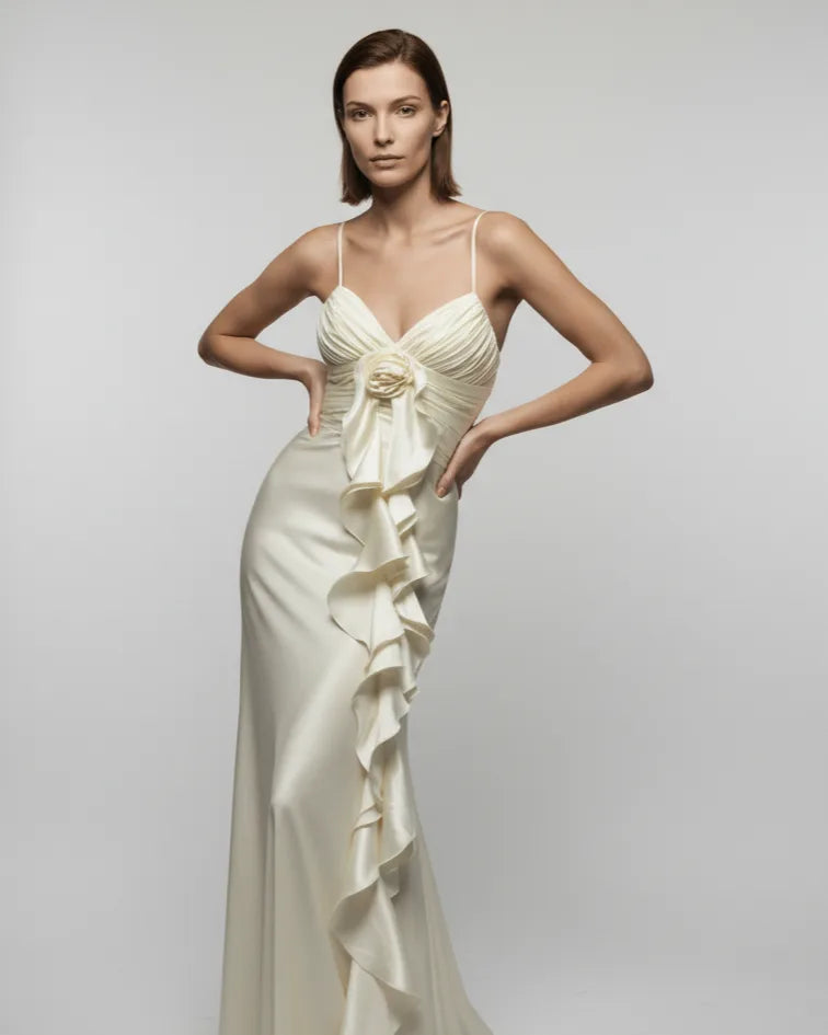 Ivory satin maxi dress with 3D flower rosette and cascading ruffle, luxury summer resort wear and party dress UK - Chiccharm Boutique.