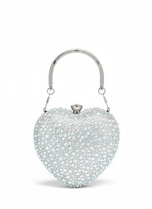 Heart-shaped handbag with sparkling details on a white background