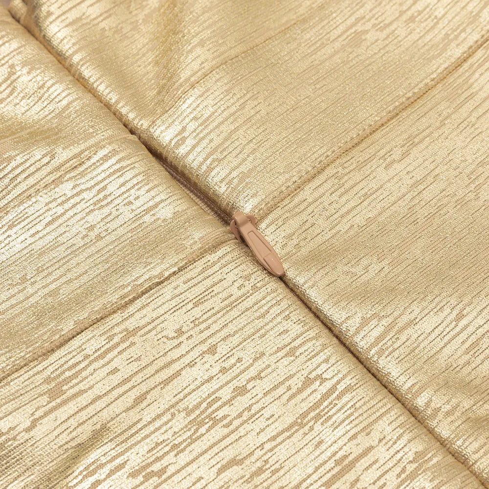 Close-up of gold metallic fabric texture