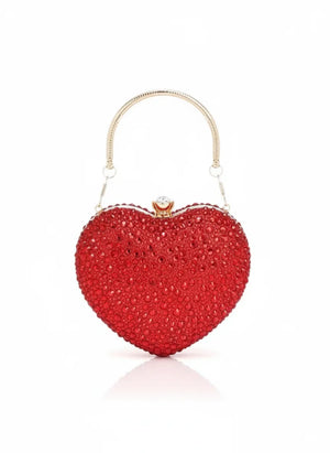 Red heart-shaped clutch bag with a handle on a white background